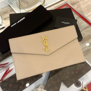 Saint Laurent Tan Clutch with Gold Logo